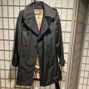 Burberry tench coat in polyester/nylon. Original price $1300.